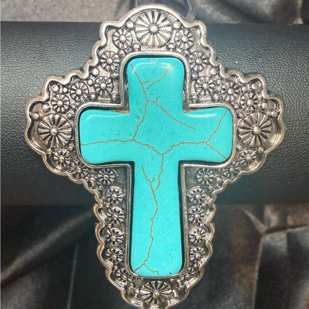 NWT Faux Turquoise and silver tone cross bracelet.  Adjustable cuff.